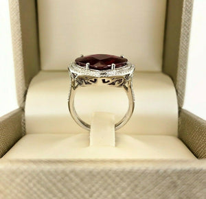 9.37 Carats t.w. Diamond and Heart Ruby Halo Ring Ruby is 8.91 Carats 18KW Gold