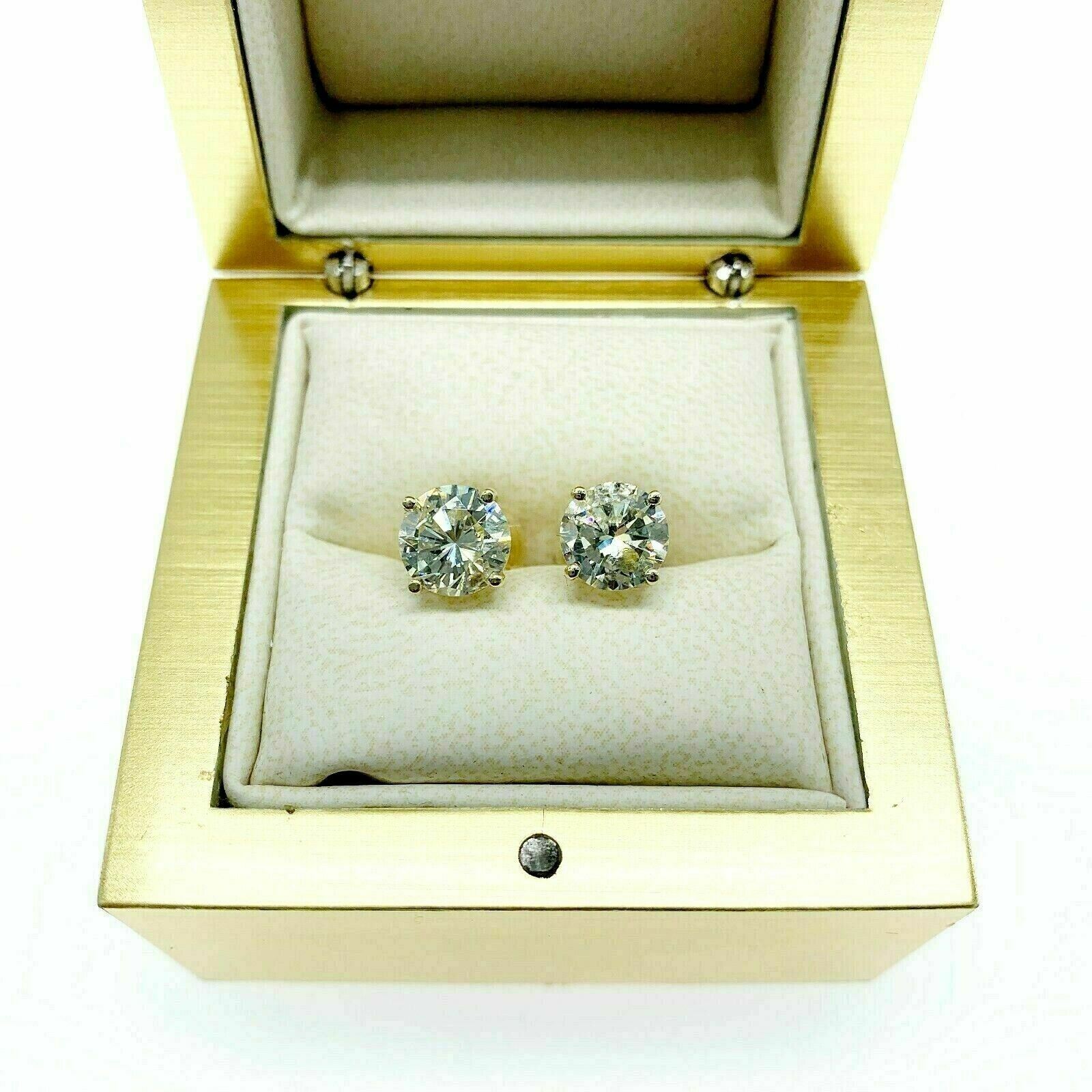 2.41 Carats t.w. round Brilliant Diamond Stud Earrings 14K Yellow Gold Settings