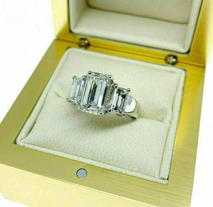 3.18 Carats t.w. 3 Stone Emerald Cut Diamond Wedding Ring GIA 2.02 H VVS2 Center