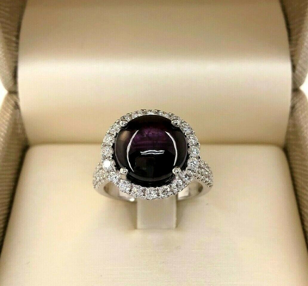 6.05 Carats Diamond and Cabochon Ruby Halo Ring Ruby is 5.07 Carats 14K Gold