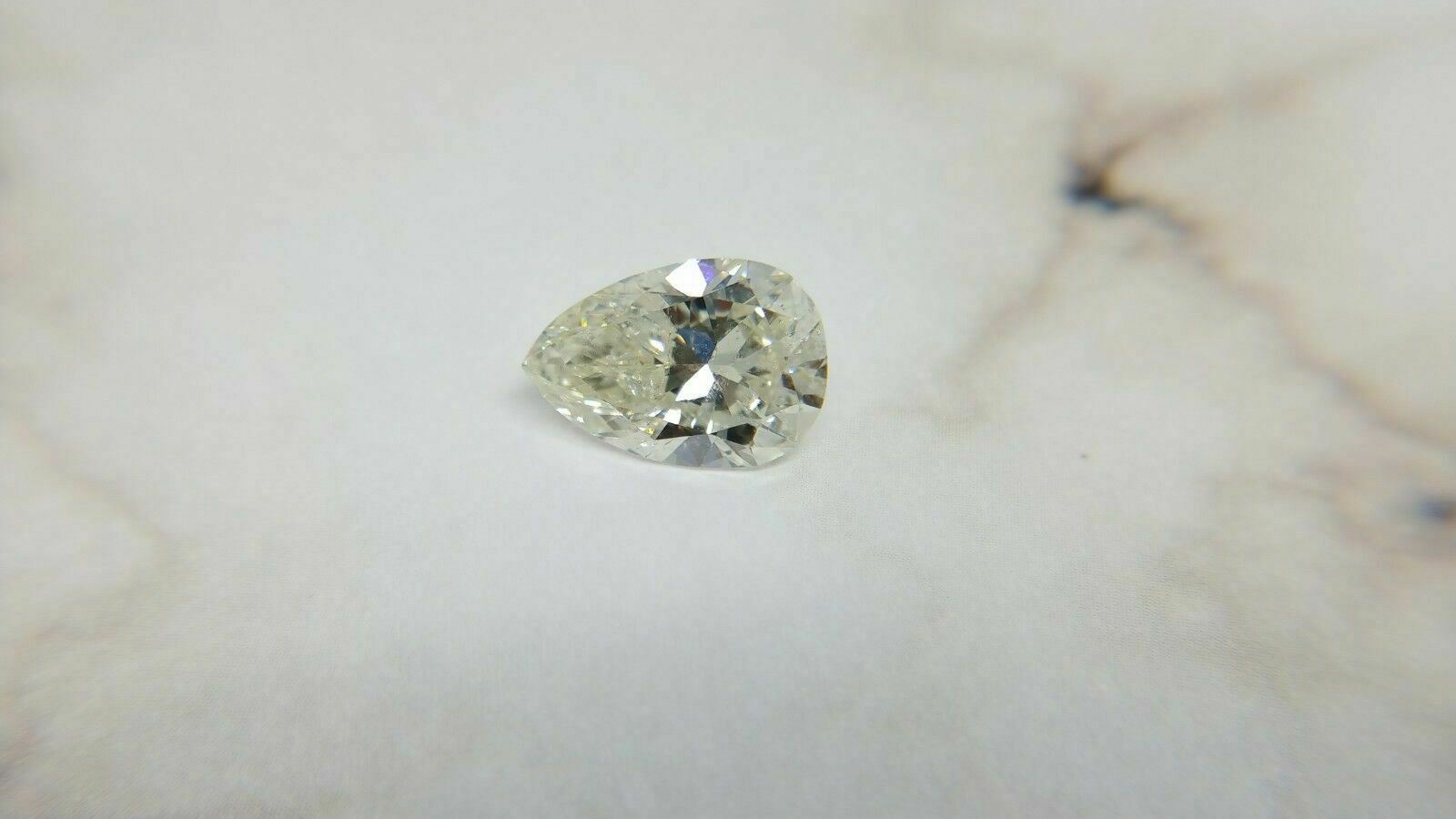 4.62 CT PEAR SHAPE – L/SI2 DIAMOND – AGS#104101572004