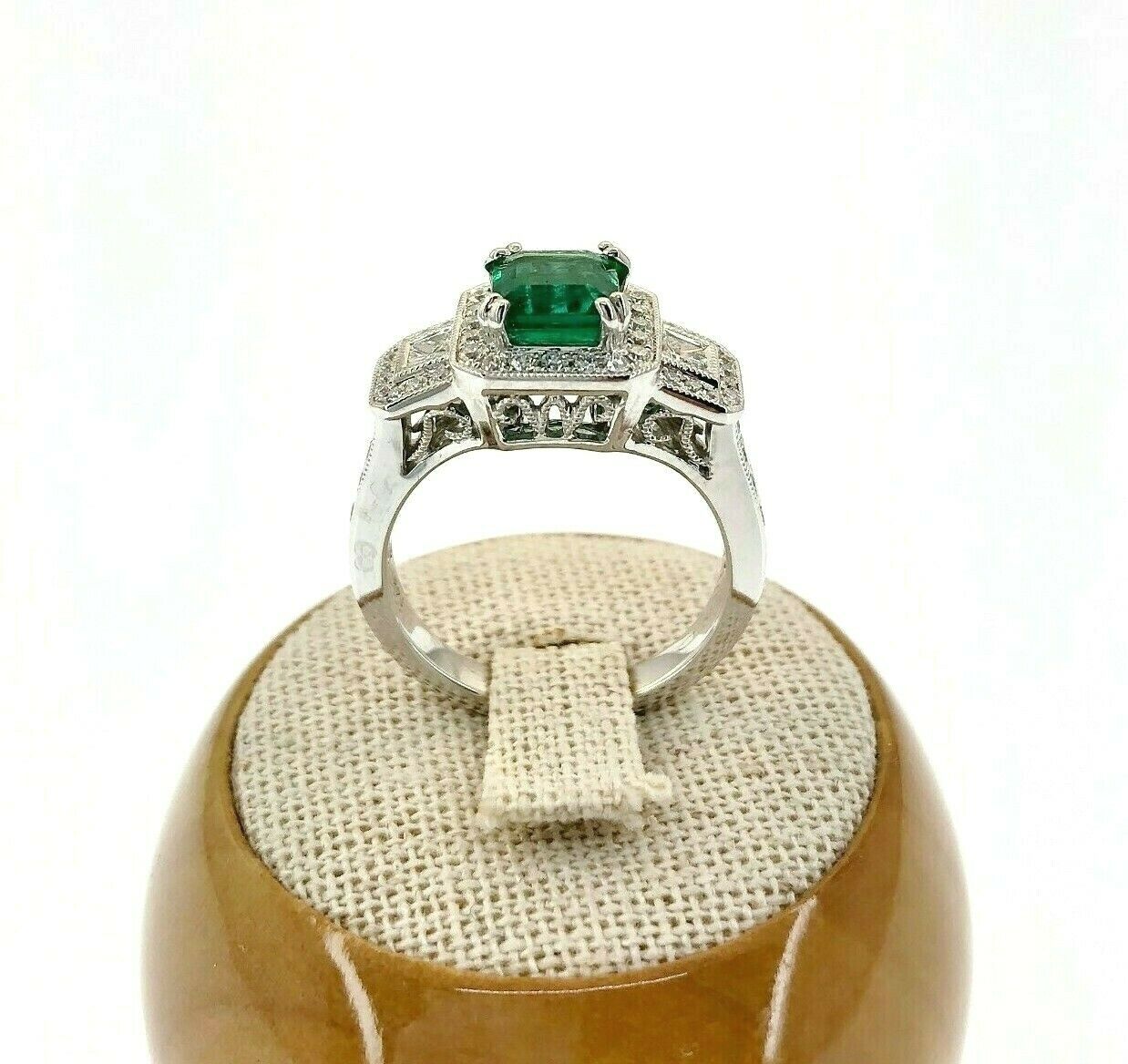 2.09 Carats t.w. Diamond and Emerald Halo Wedding Ring Emerald is 1.44 Carats