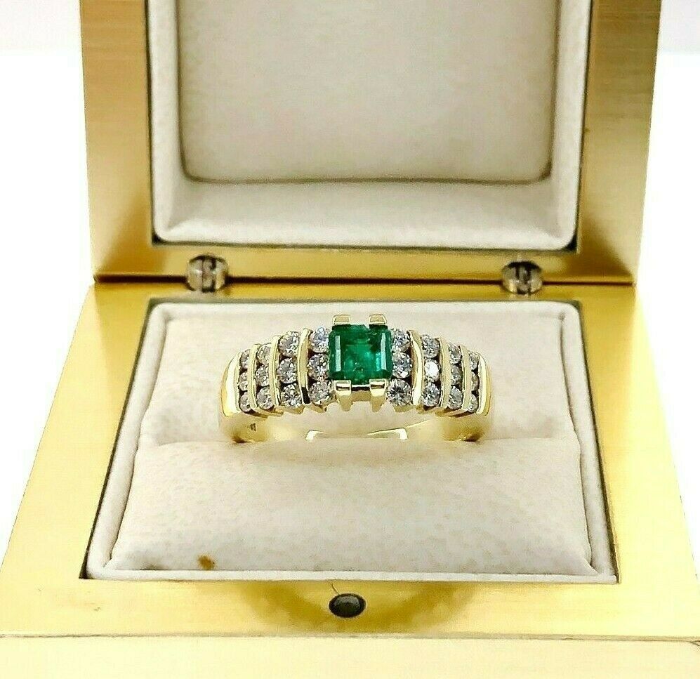 Fine 0.85 Carats t.w. Diamond and Colombian Emerald Channel Set Ring 18K Gold