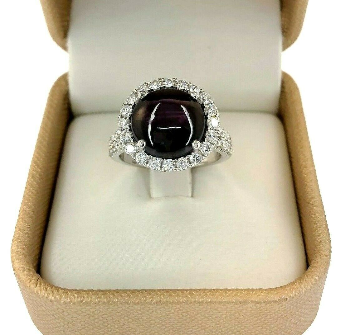 6.05 Carats Diamond and Cabochon Ruby Halo Ring Ruby is 5.07 Carats 14K Gold