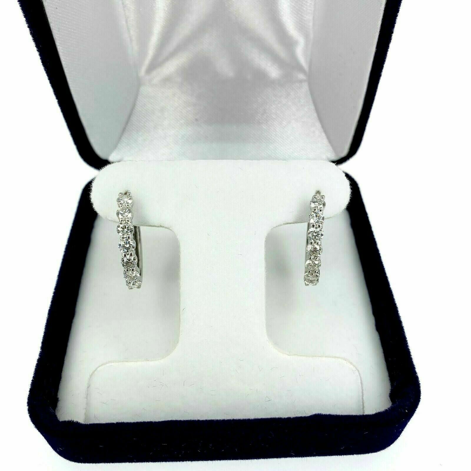 1.35 Carats t.w. Diamond Oval Hoop Earrings 14 Karat White Gold 0.75 Inch Drop