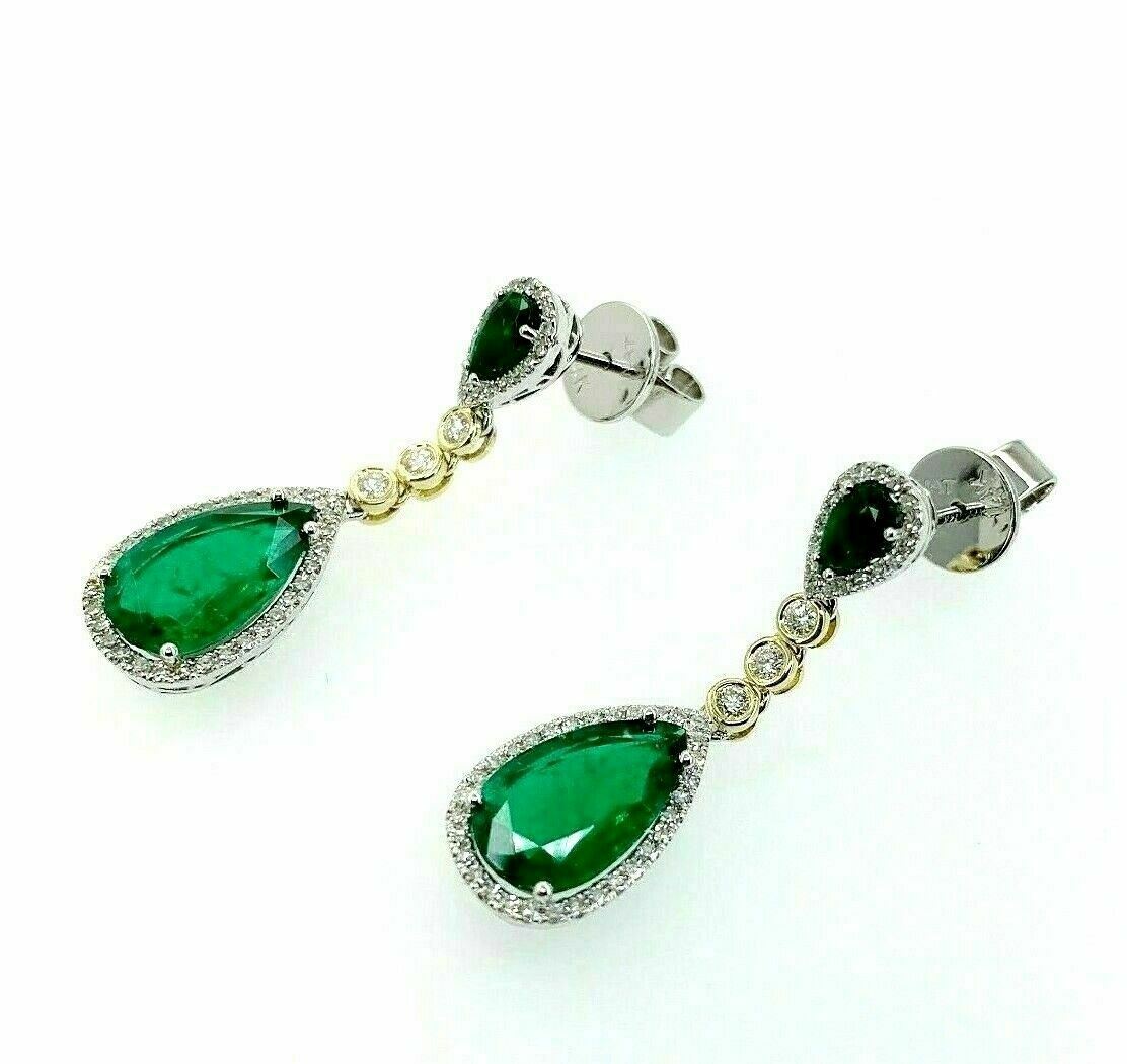 3.95 Carats t.w. Emerald and Diamond Dangle Earrings Emeralds are 3.50 Carats tw