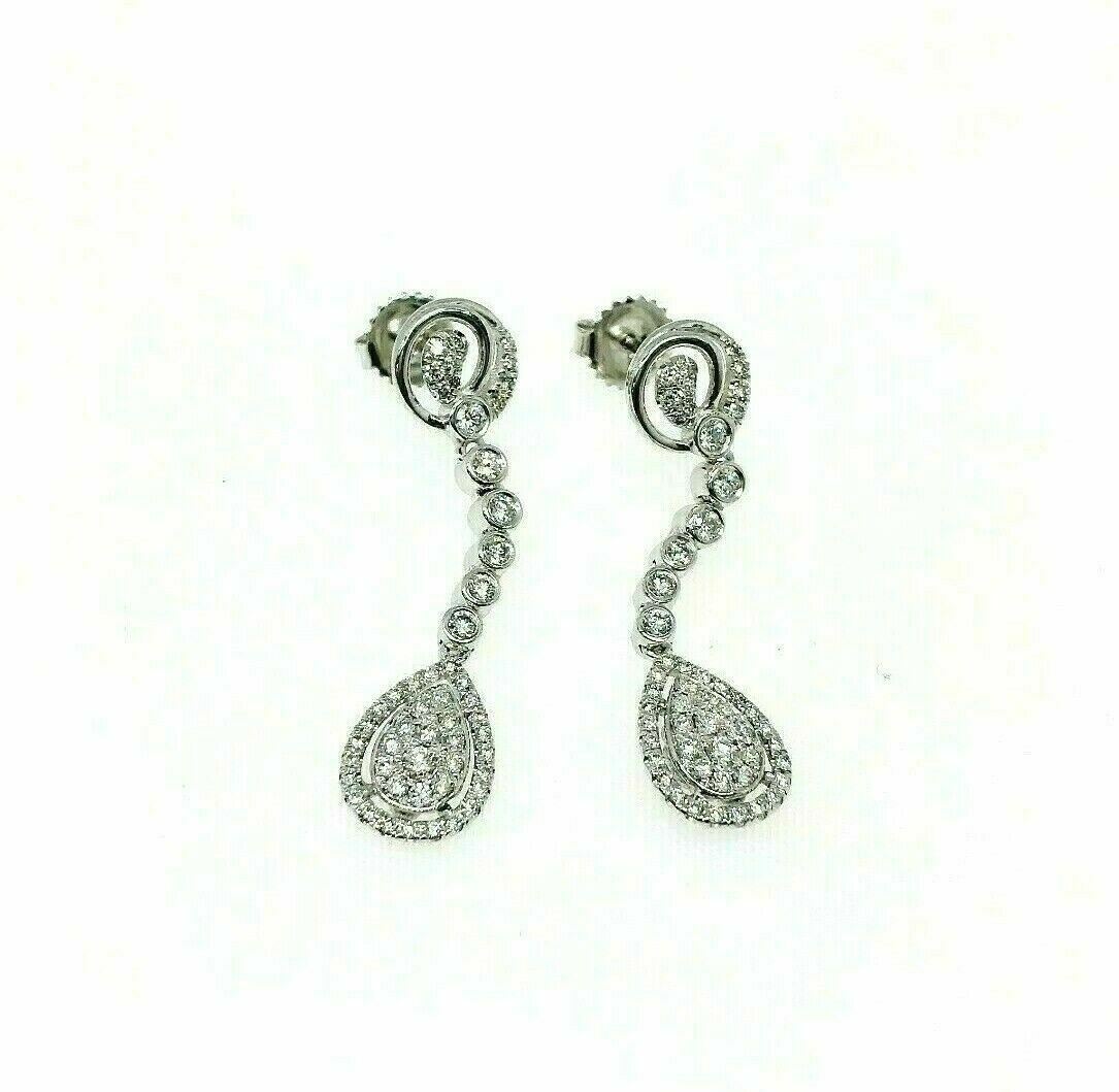 1.15 Carats t.w. Diamond Halo Dangle Earrings 18 Karat White Gold Brand New