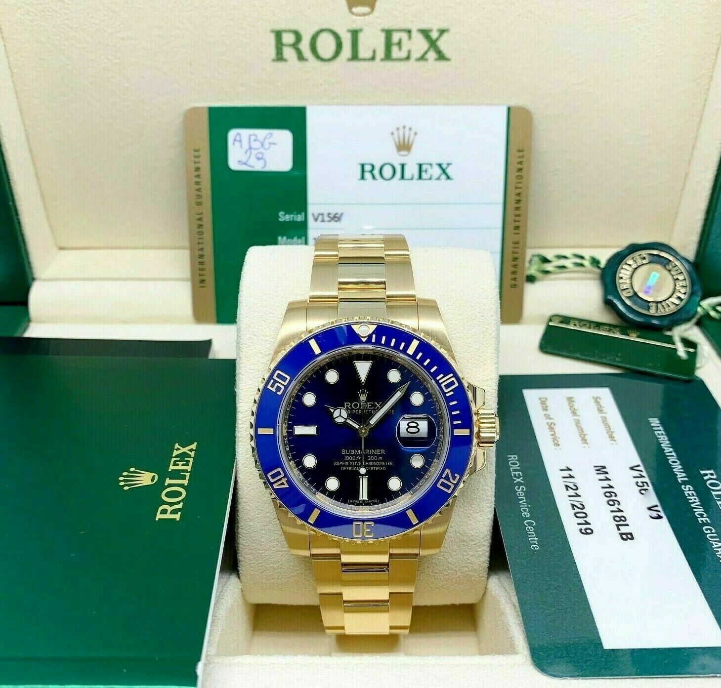Rolex 40MM 18K Yellow Gold Blue Submariner Date Ref 116618LB Box and Card