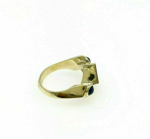 1.42 Carats t.w. Invisible Set Diamond and Cabochon Sapphire Ring 18K YellowGold