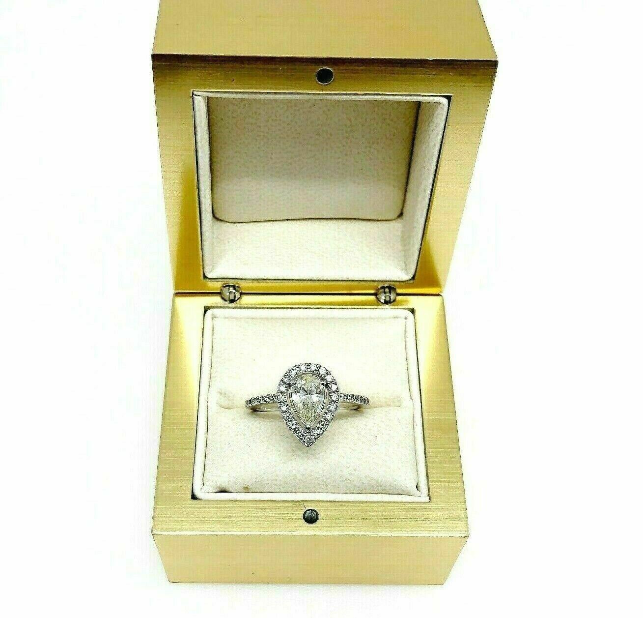 1.18 Carats t.w. Pear Halo Diamond Engagement Ring 0.83 Diamond Center 14K Gold
