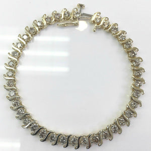 3.32 Carats t.w. Diamond S Tennis Bracelet 14K Gold 11.6 Grams