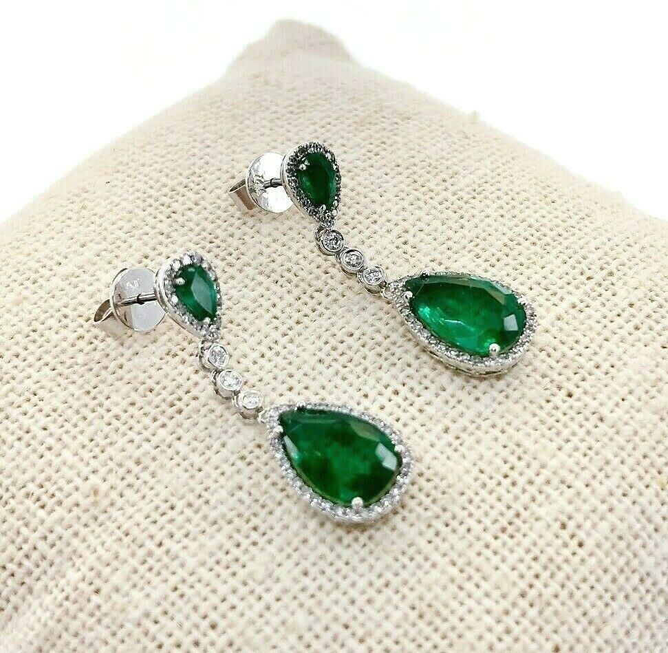 3.72 Carats t.w. Emerald and Diamond Dangle Earrings Emeralds are 3.32 Carats tw