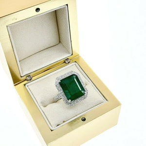 8.77 Carats t.w. Diamond and Emerald Halo Pave Set Ring Emerald is 8.32 Carats